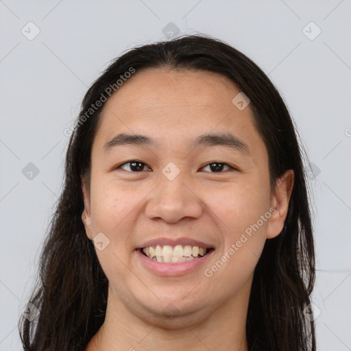 Joyful white young-adult female with long  brown hair and brown eyes