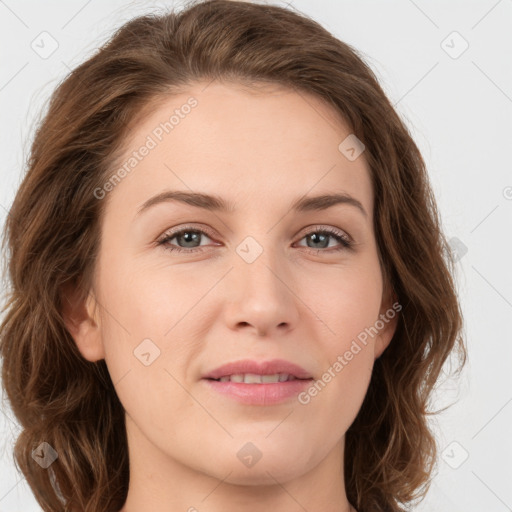 Joyful white young-adult female with long  brown hair and green eyes