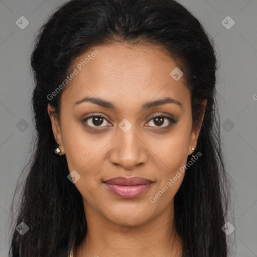 Joyful black young-adult female with long  brown hair and brown eyes