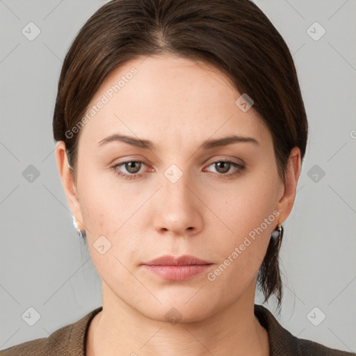 Neutral white young-adult female with short  brown hair and grey eyes