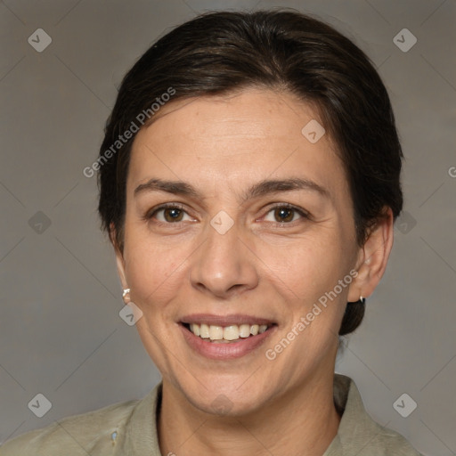 Joyful white adult female with medium  brown hair and brown eyes