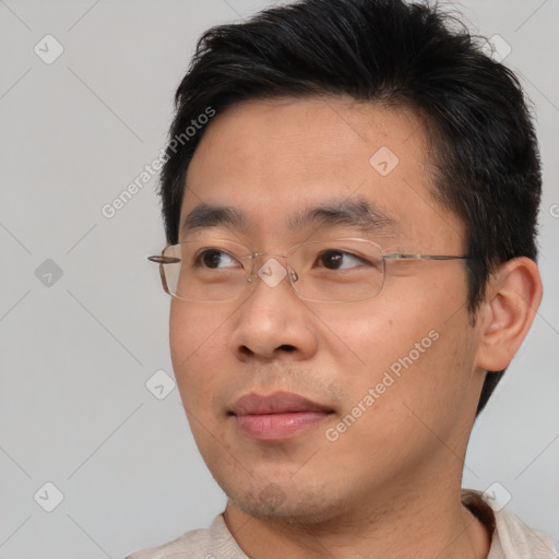 Neutral asian adult male with short  brown hair and brown eyes