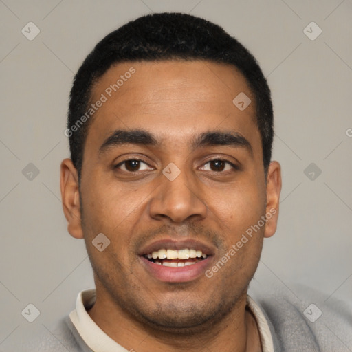 Joyful latino young-adult male with short  black hair and brown eyes