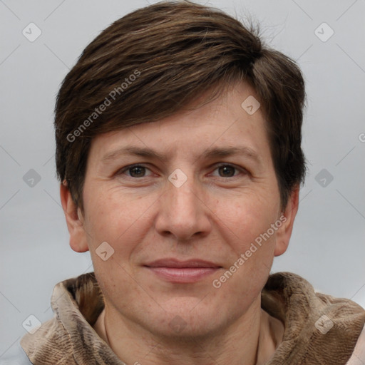 Joyful white adult male with short  brown hair and grey eyes