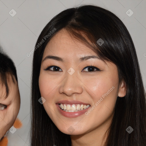 Joyful white young-adult female with long  brown hair and brown eyes