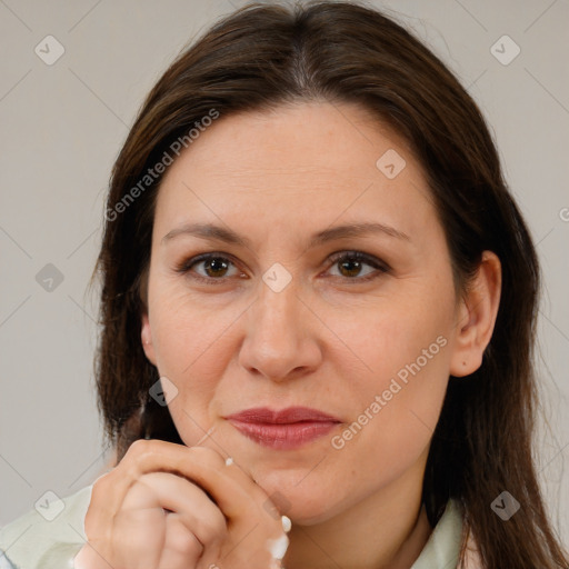 Joyful white adult female with medium  brown hair and brown eyes