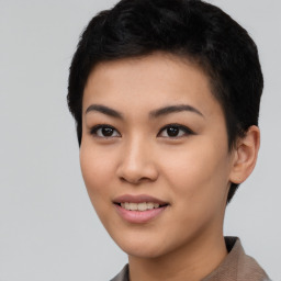 Joyful asian young-adult female with short  black hair and brown eyes