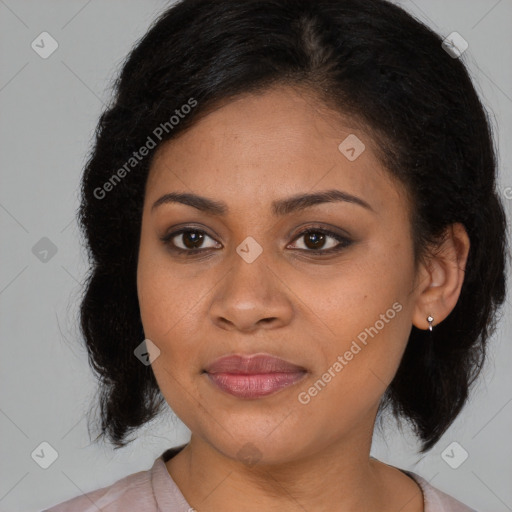 Joyful latino young-adult female with medium  brown hair and brown eyes