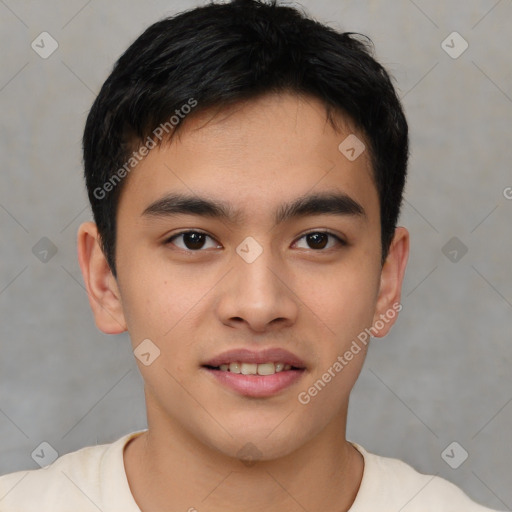 Joyful asian young-adult male with short  brown hair and brown eyes