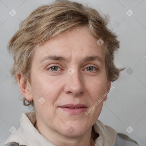 Joyful white adult male with short  brown hair and grey eyes