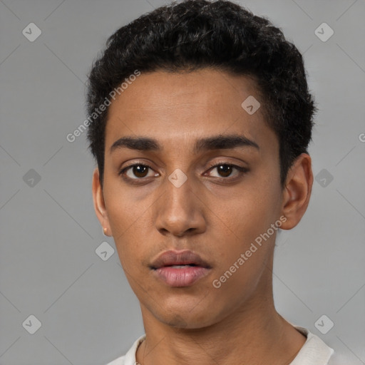 Neutral latino young-adult male with short  black hair and brown eyes