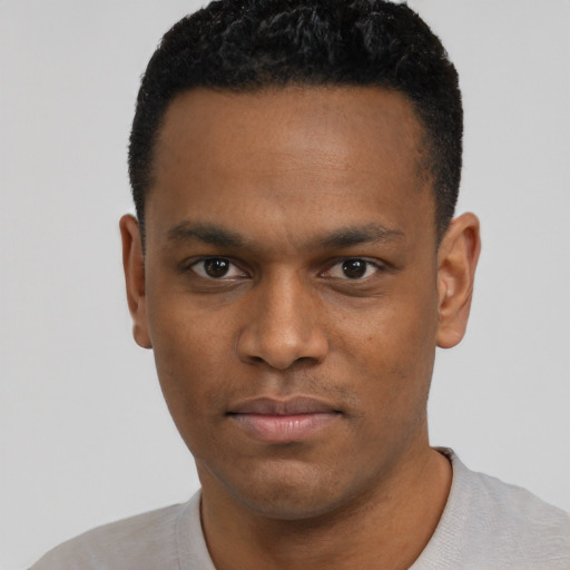 Neutral black young-adult male with short  black hair and brown eyes