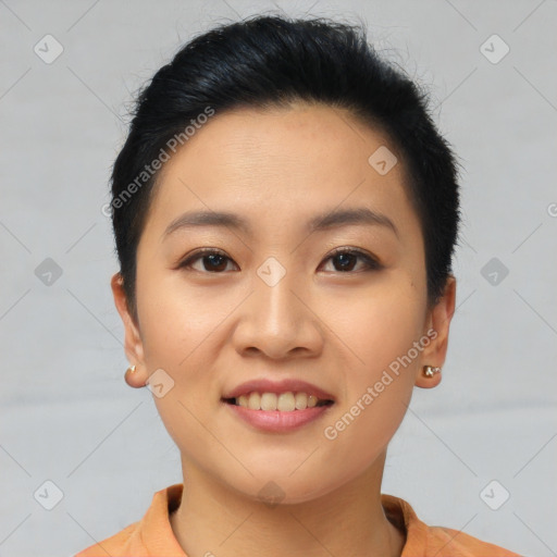 Joyful asian young-adult female with short  black hair and brown eyes