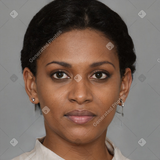 Joyful black young-adult female with short  brown hair and brown eyes