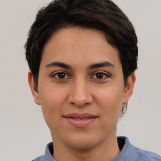 Joyful white young-adult female with short  brown hair and brown eyes