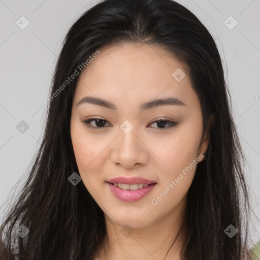 Joyful asian young-adult female with long  brown hair and brown eyes