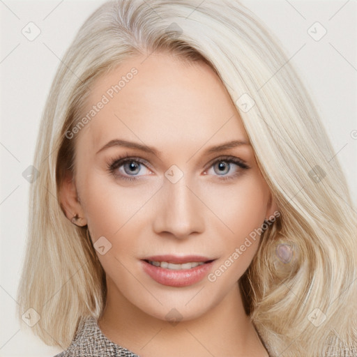 Joyful white young-adult female with long  brown hair and blue eyes