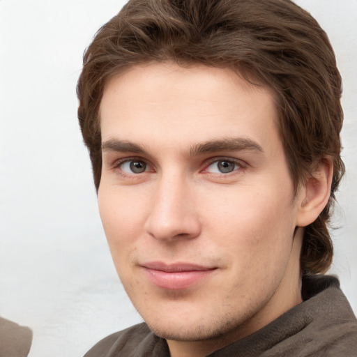 Neutral white young-adult male with short  brown hair and grey eyes