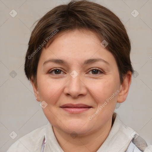 Joyful white adult female with short  brown hair and brown eyes