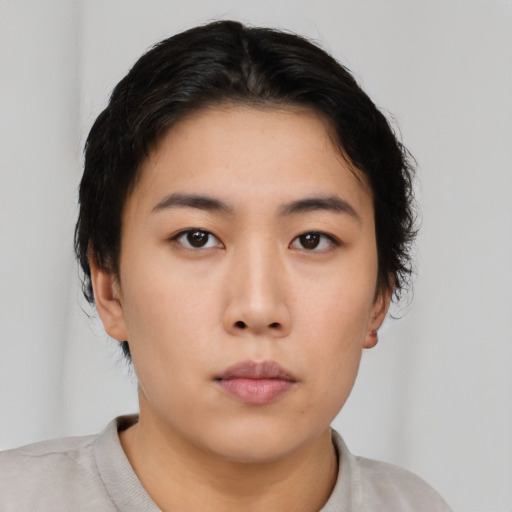 Neutral asian young-adult female with short  brown hair and brown eyes
