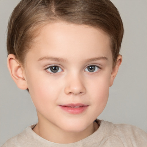 Joyful white child female with short  brown hair and brown eyes