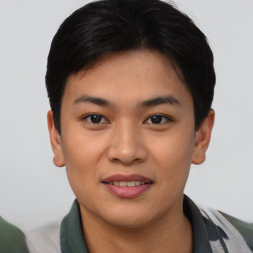 Joyful asian young-adult female with short  black hair and brown eyes