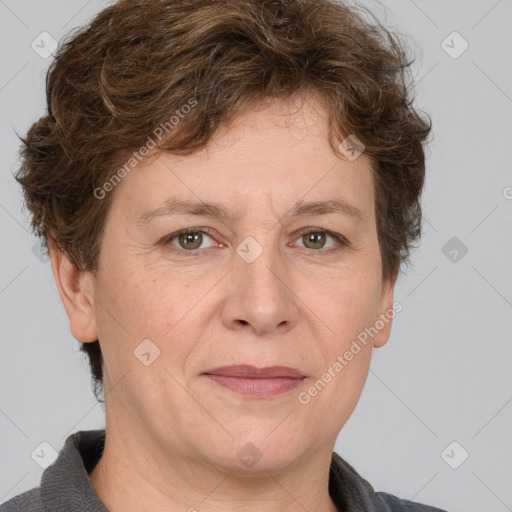 Joyful white adult female with short  brown hair and grey eyes