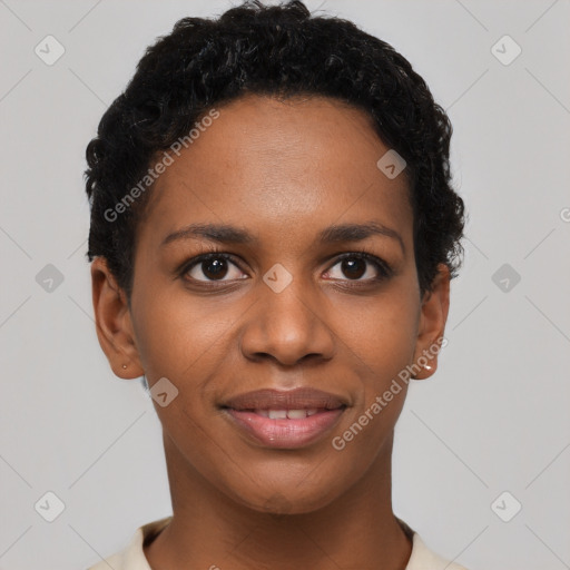 Joyful black young-adult female with short  black hair and brown eyes