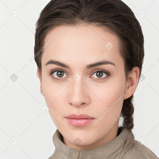 Neutral white young-adult female with long  brown hair and brown eyes