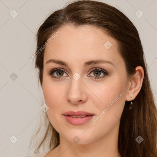 Joyful white young-adult female with long  brown hair and grey eyes