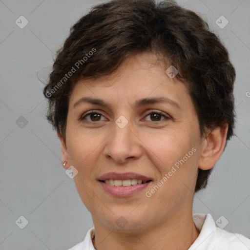 Joyful white adult female with short  brown hair and brown eyes