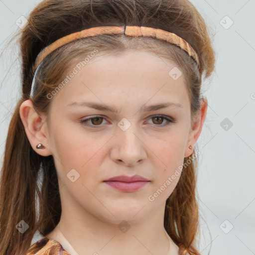 Joyful white child female with medium  brown hair and brown eyes