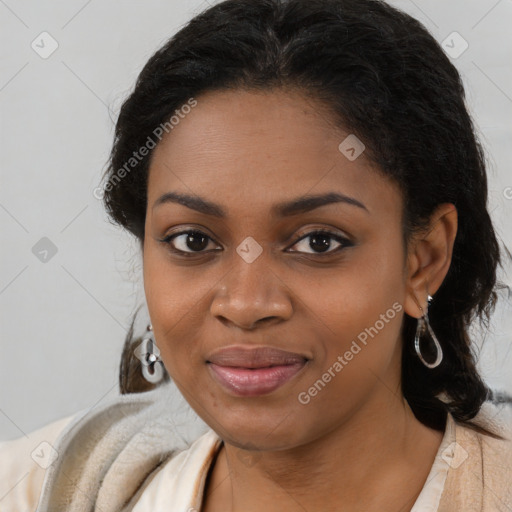 Joyful black young-adult female with long  brown hair and brown eyes