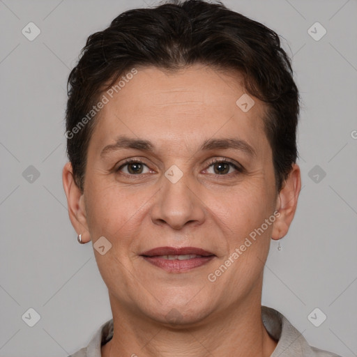 Joyful white adult female with short  brown hair and brown eyes