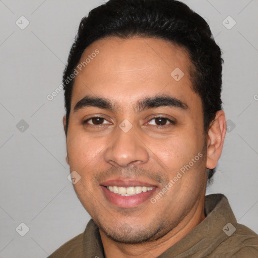 Joyful white young-adult male with short  black hair and brown eyes