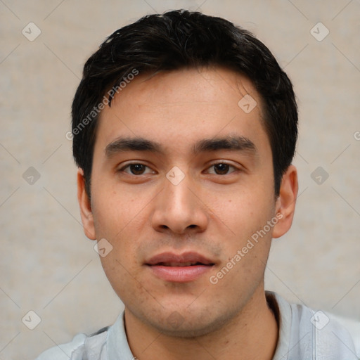 Neutral white young-adult male with short  black hair and brown eyes