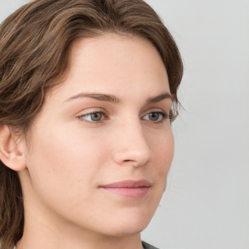 Neutral white young-adult female with medium  brown hair and grey eyes