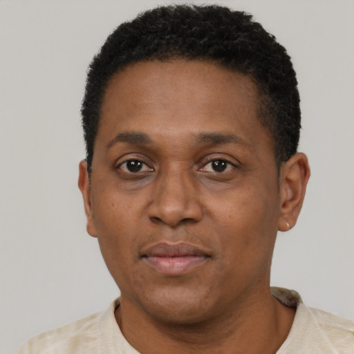Neutral black adult male with short  black hair and brown eyes