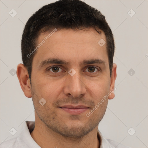 Joyful white young-adult male with short  brown hair and brown eyes