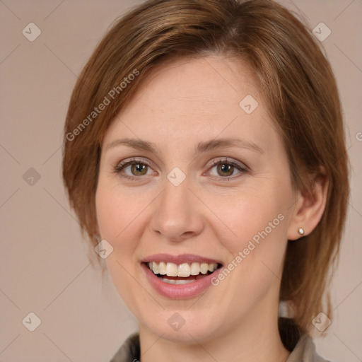 Joyful white young-adult female with medium  brown hair and green eyes