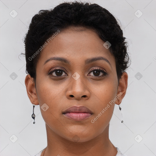 Joyful latino young-adult female with short  brown hair and brown eyes