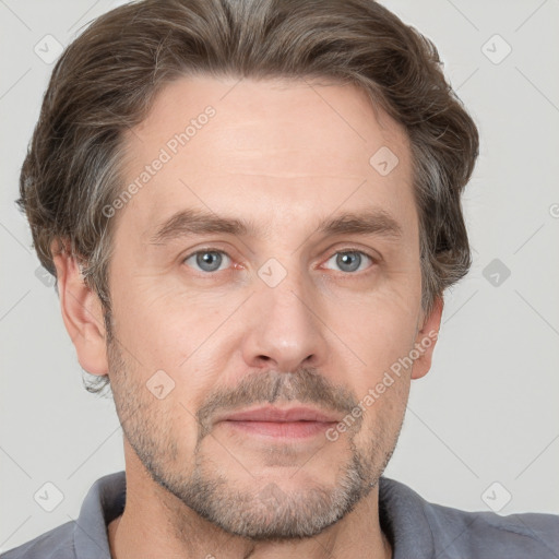 Neutral white adult male with short  brown hair and grey eyes