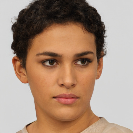 Neutral white young-adult female with short  brown hair and brown eyes