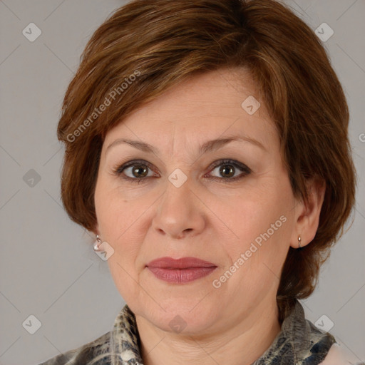 Joyful white adult female with medium  brown hair and brown eyes