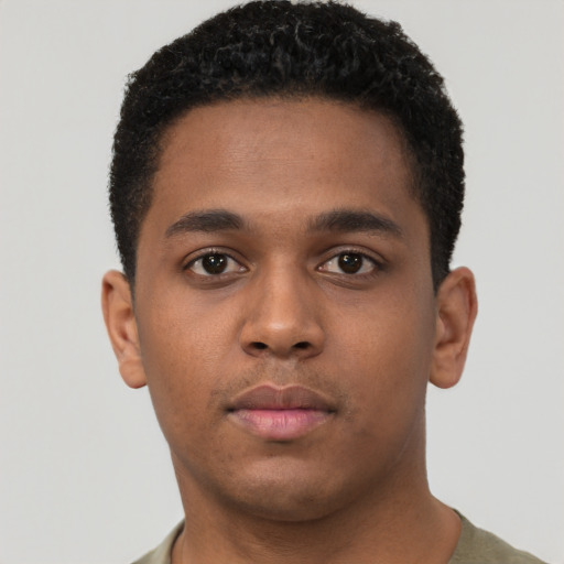 Neutral black young-adult male with short  brown hair and brown eyes