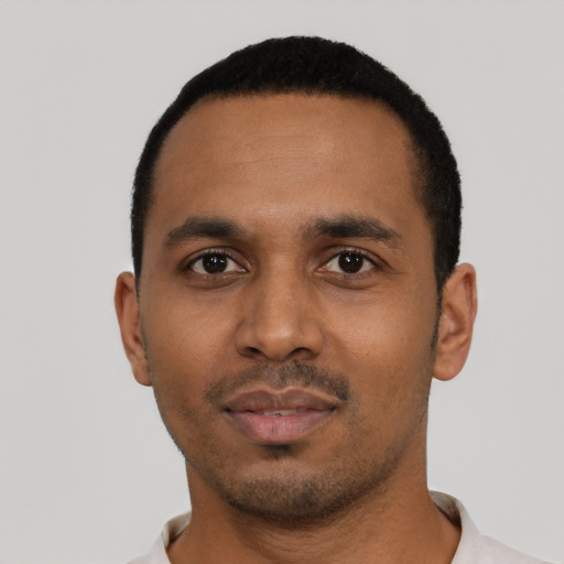 Neutral black young-adult male with short  black hair and brown eyes