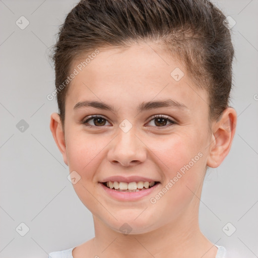 Joyful white child female with short  brown hair and brown eyes