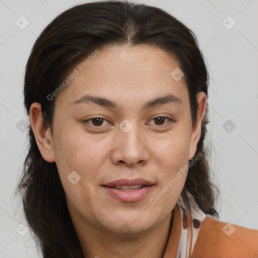 Joyful white adult female with medium  brown hair and brown eyes