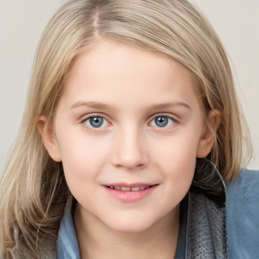 Joyful white child female with medium  brown hair and grey eyes