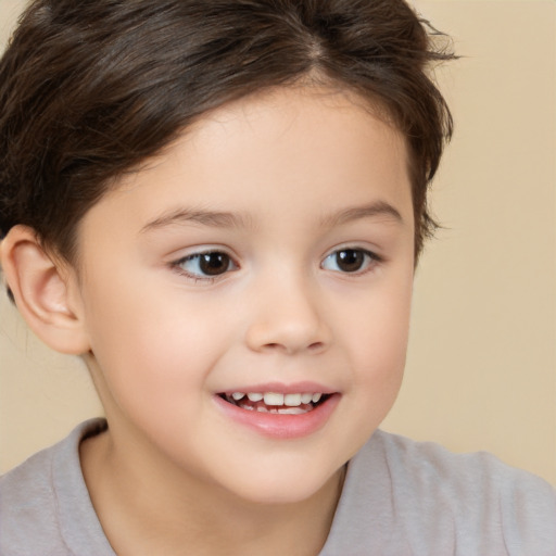 Joyful white child female with short  brown hair and brown eyes